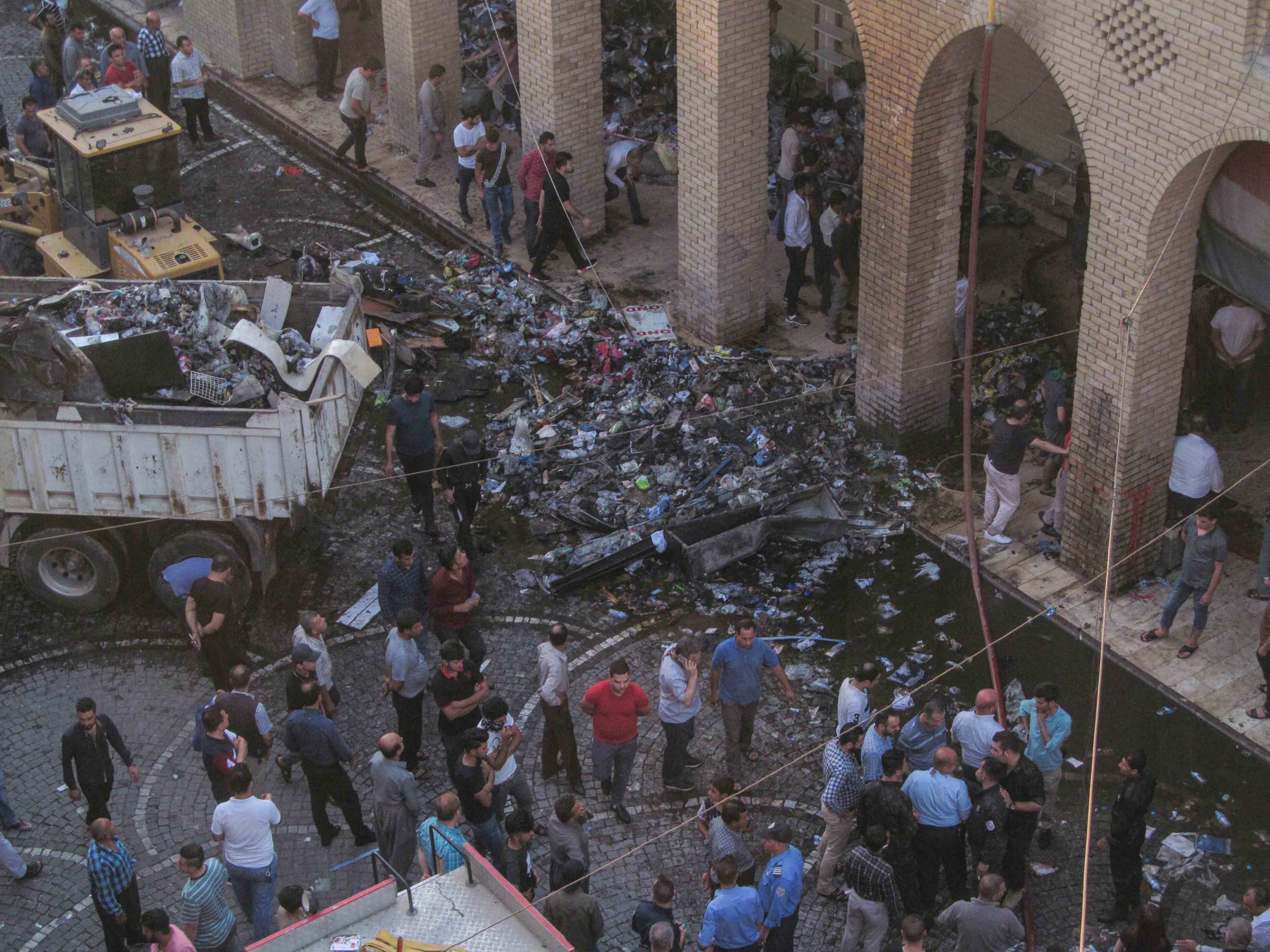 PHOTOS: Firefighters extinguish blaze in Erbil's old market 